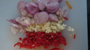 Chop the onion, garlic and chilli pepper